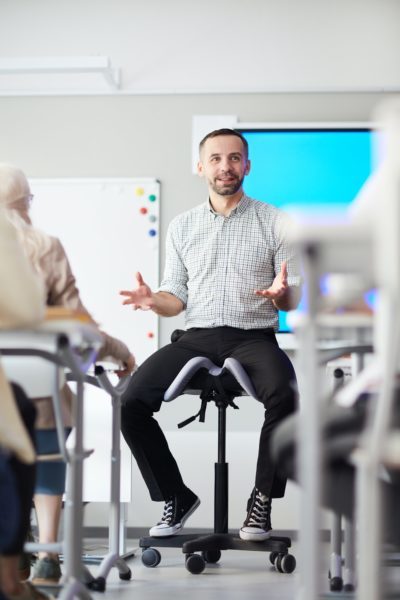 Teacher in front of audience